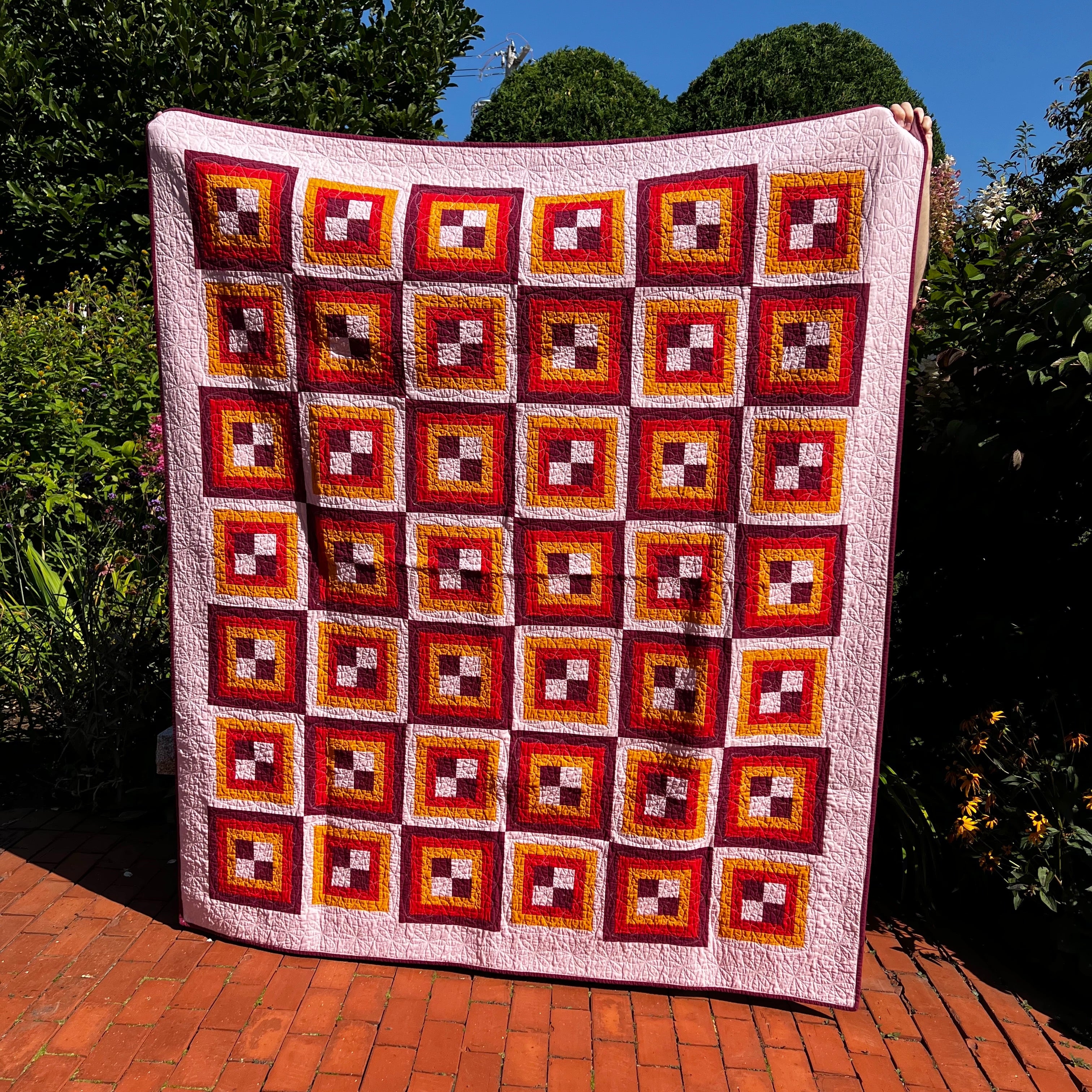 rec room - block pattern handmade quilt - red, pink, white, orange