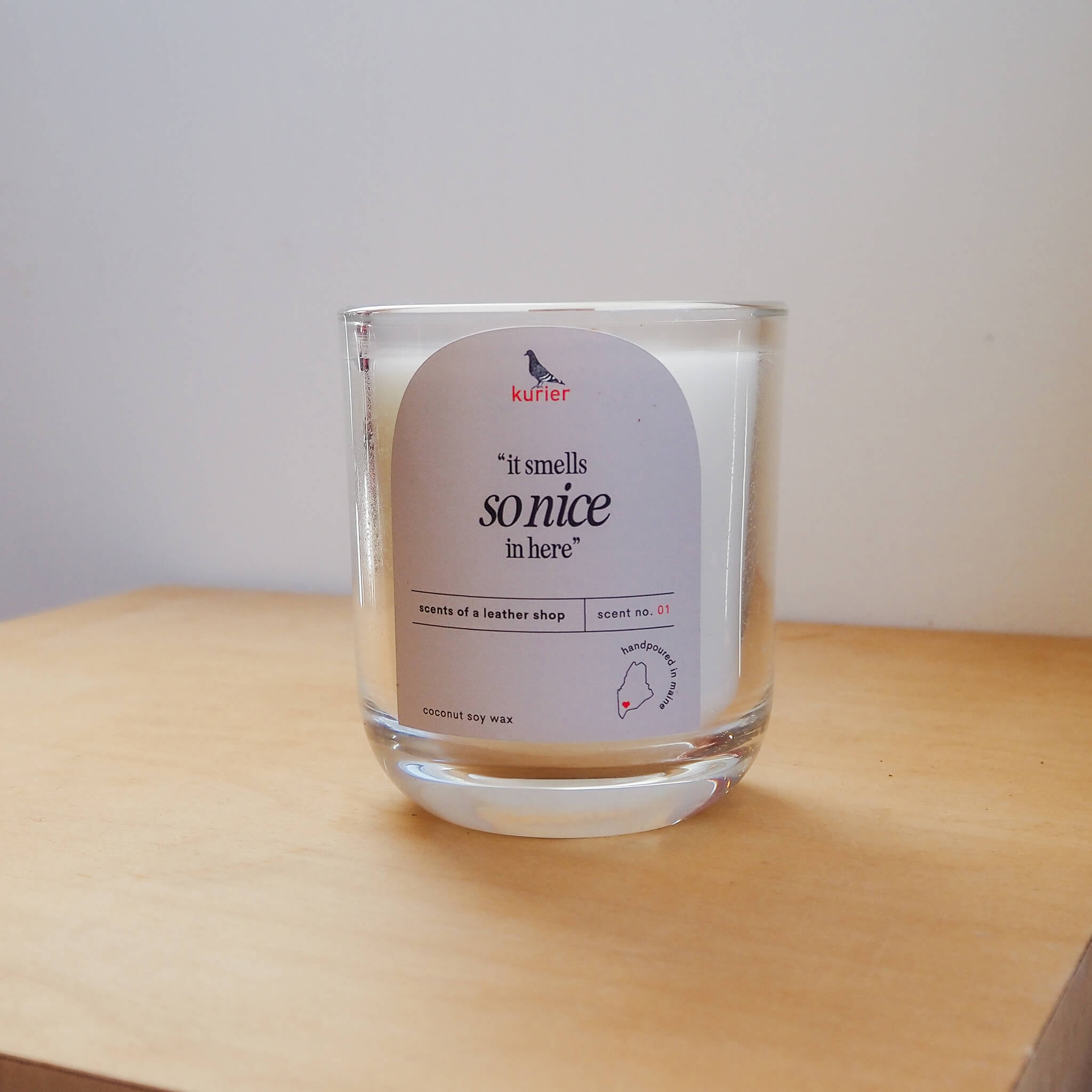 kurier's signature scented goods - glass candle - "it smells so nice in here"