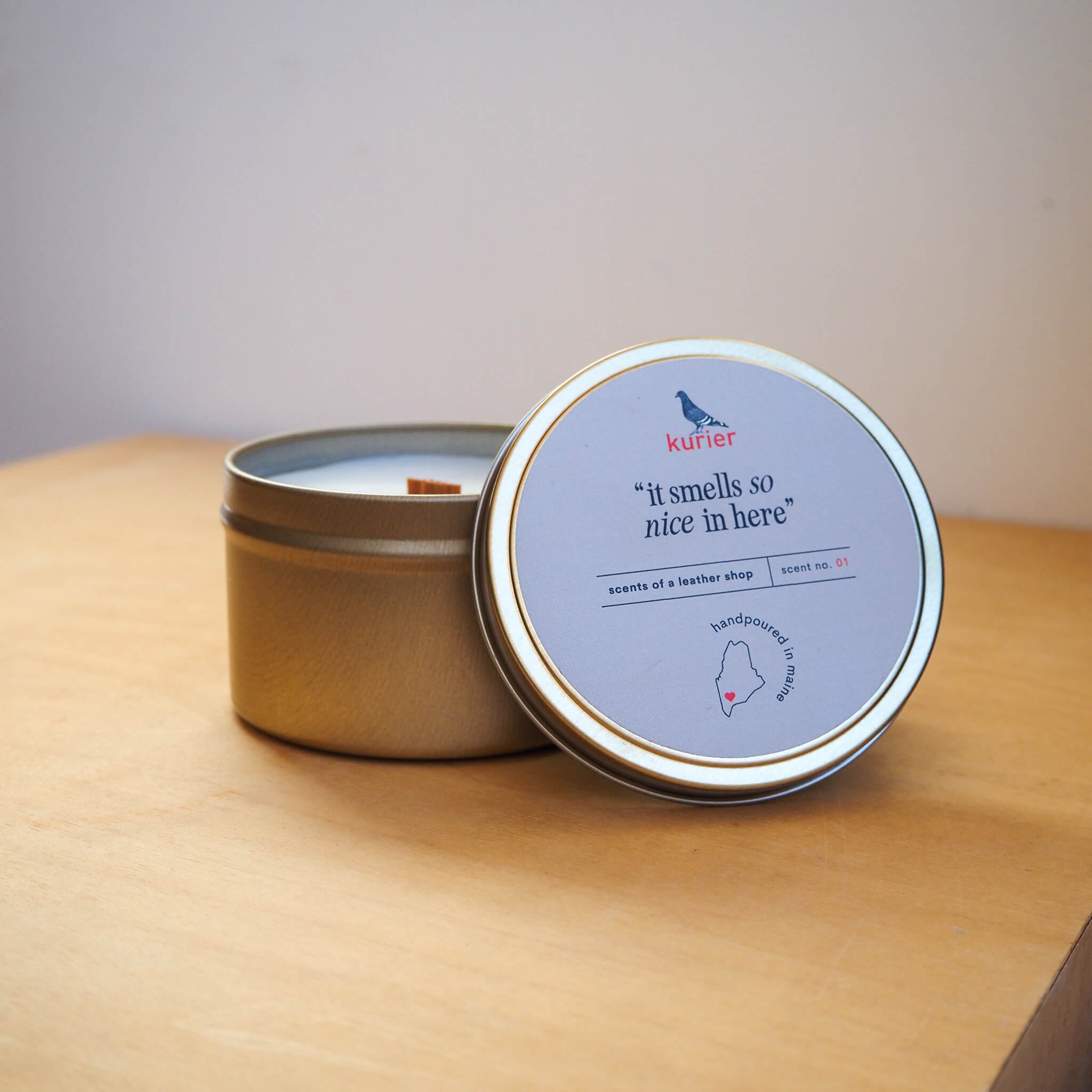 kurier's signature scented goods - tin candle - "it smells so nice in here"