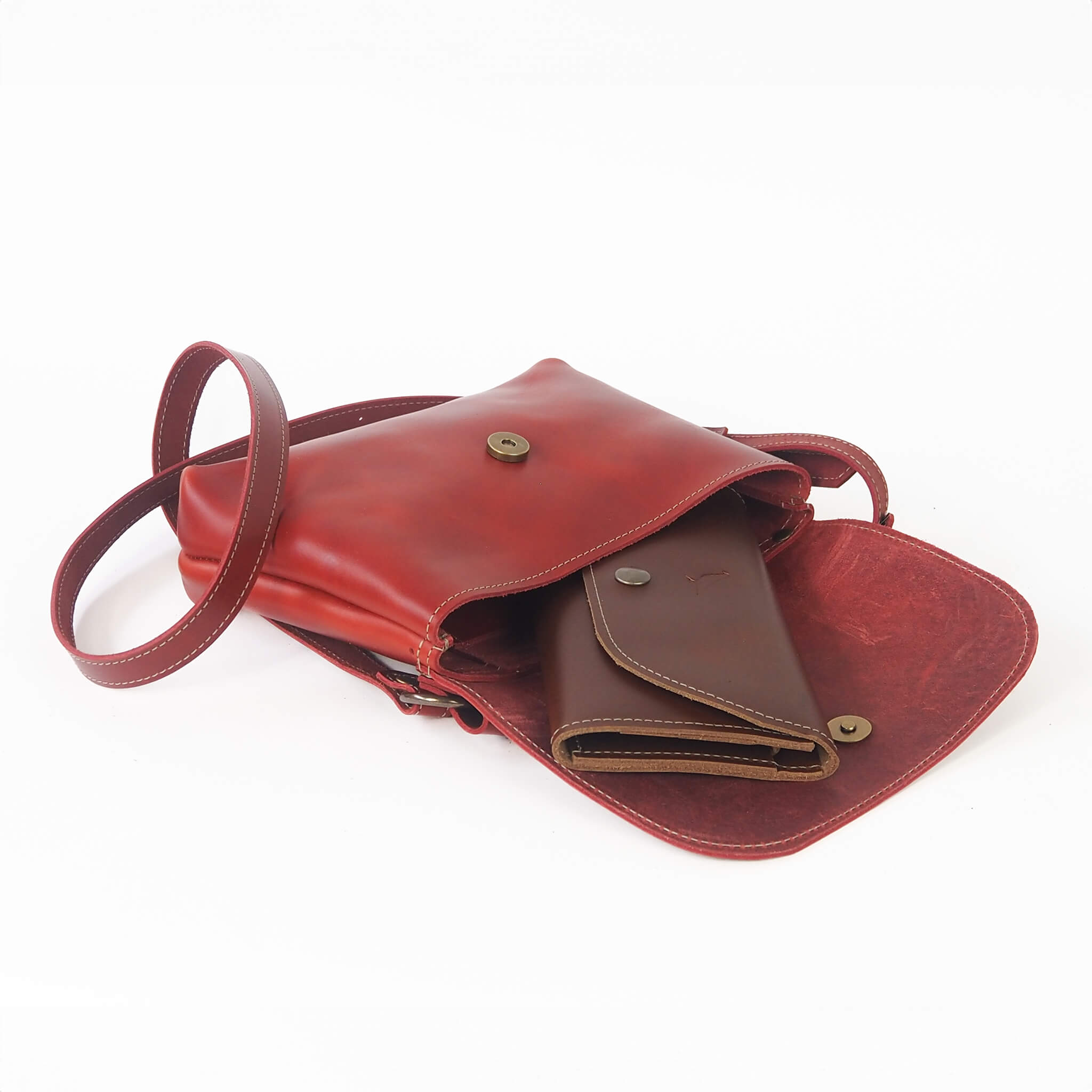 lola handbag crossbody adjustable handmade leather - cherry top view
