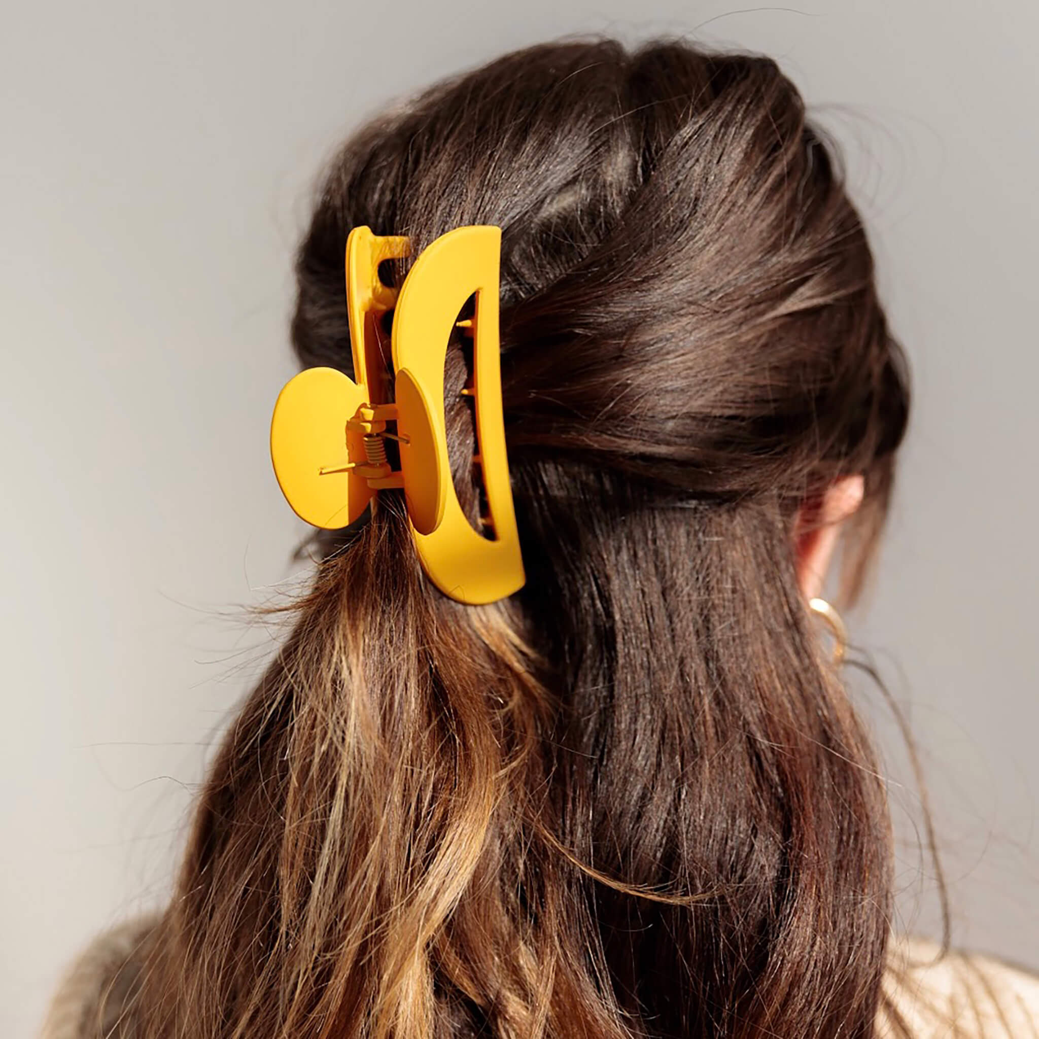our favorite butterfly hair clip - marigold model view