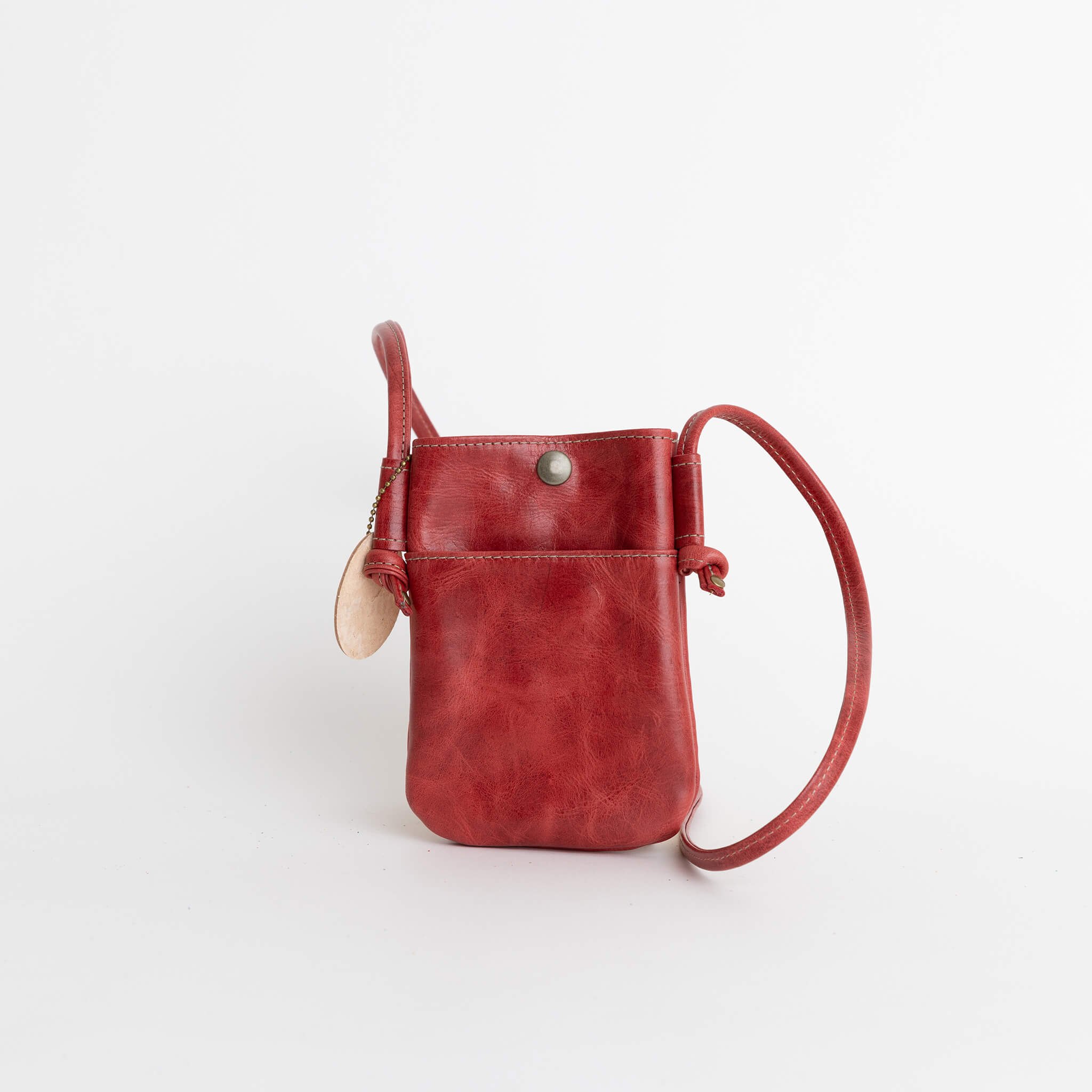 thompson crossbody pouch - handmade leather - cardinal front view